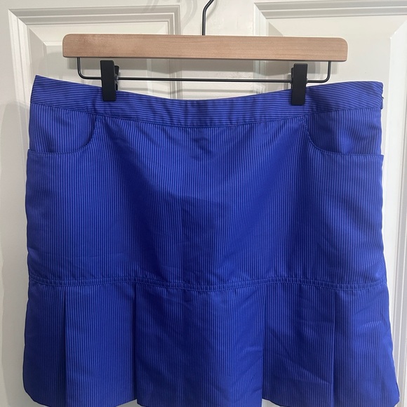 adidas Pants - Adidas size 12 athletic golf skirt with front pleats, pockets, side zip. Stripes